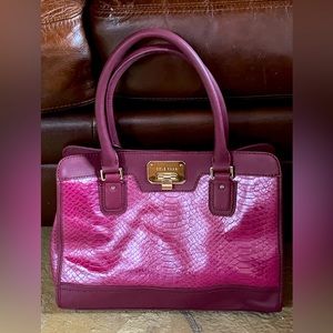 Designer Cole Haan leather purse. Measures 14”Wx 11”H x 4”D. Double stitching.